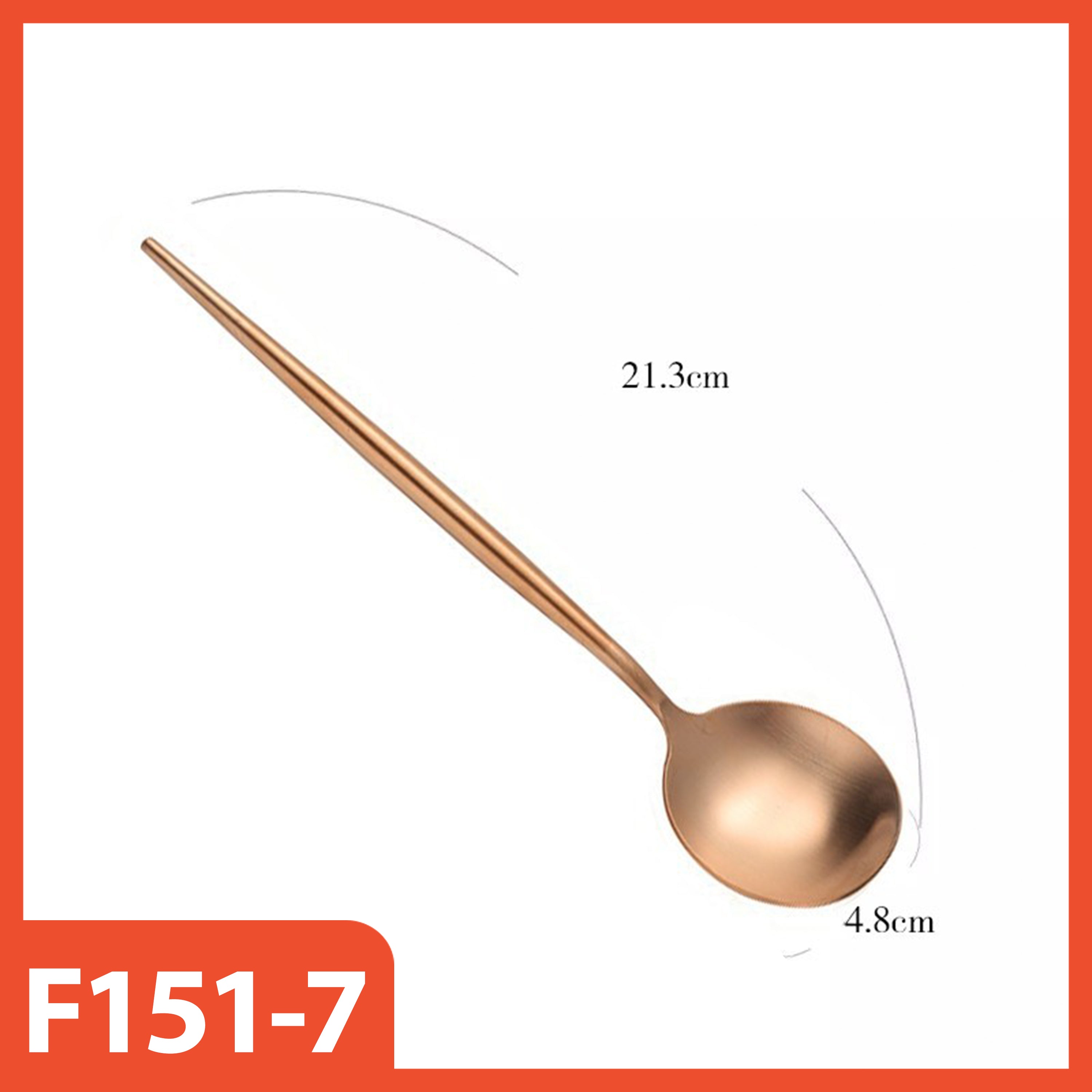 Copper-colored spoon with measurements on a white background