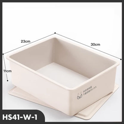 Tampilan tiga perempat dari kotak penyimpanan organizer model HS41-W-1 berwarna krem atau putih gading dengan penutupnya di bawah. Dimensi produk terlihat jelas: panjang 30cm, lebar 23cm, dan tinggi 11cm.